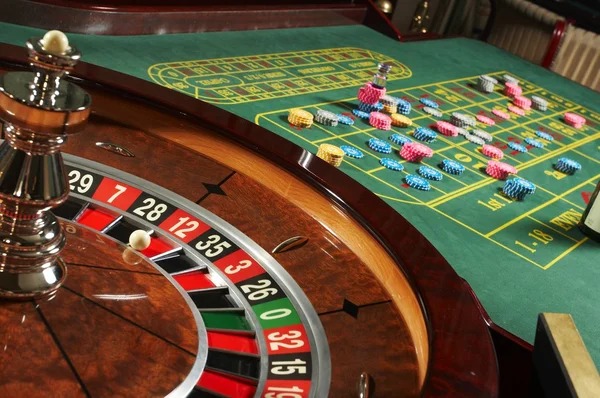 Live dealer poker action with community cards visible
